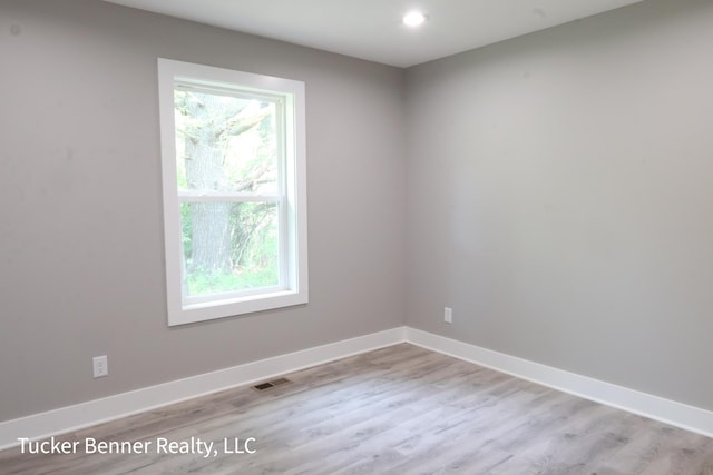 518 S Sullivan Ave, Fremont, MI 49412 - unfurnished room with light wood finished floors and recessed lighting