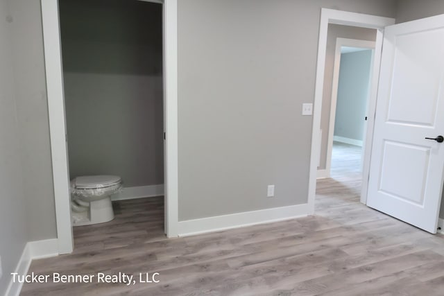 518 S Sullivan Ave, Fremont, MI 49412 - unfurnished bedroom featuring wood finished floors