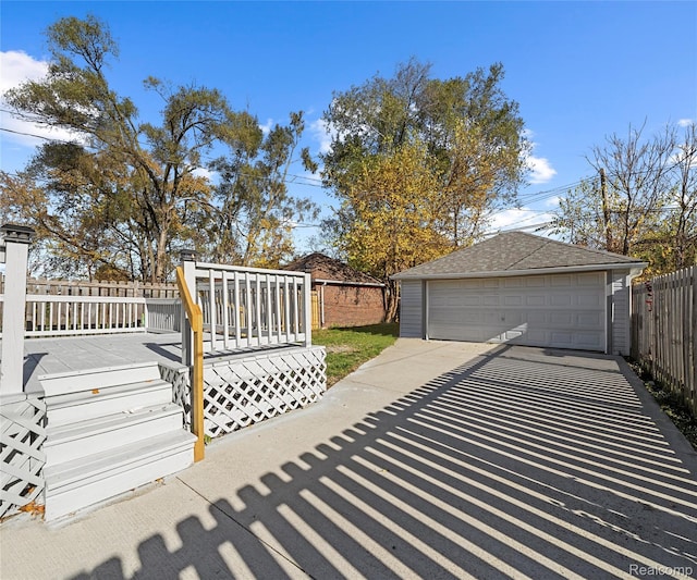 16554 Muirland St, Detroit, MI 48221 - deck featuring a detached garage and an outdoor structure