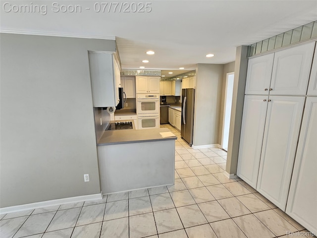 53120 Odilon Ave, Shelby Twp, MI 48316 - kitchen featuring freestanding refrigerator, white double oven, a peninsula, light tile patterned floors, and recessed lighting