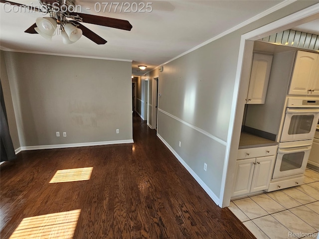 53120 Odilon Ave, Shelby Twp, MI 48316 - unfurnished room with ceiling fan, light wood finished floors, and ornamental molding
