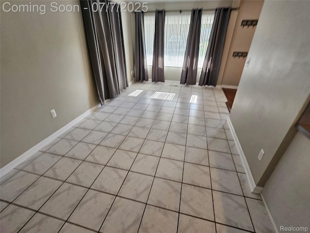 53120 Odilon Ave, Shelby Twp, MI 48316 - spare room featuring light tile patterned floors and baseboards