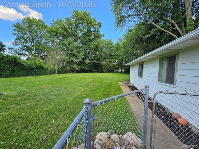 53120 Odilon Ave, Shelby Twp, MI 48316 - view of yard with view of wooded area and a gate