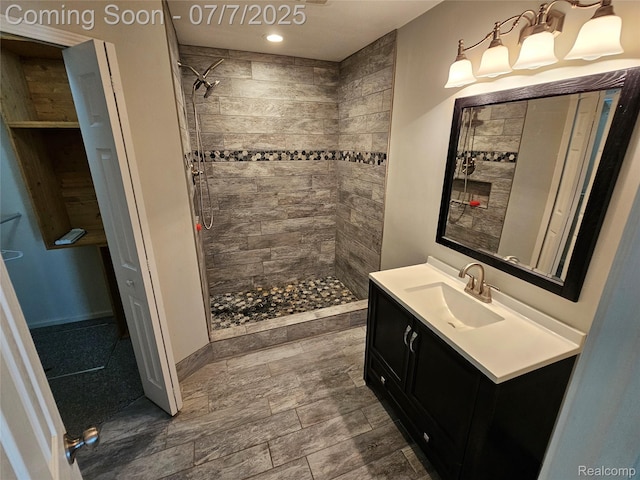 53120 Odilon Ave, Shelby Twp, MI 48316 - full bath featuring vanity, tiled shower, and recessed lighting