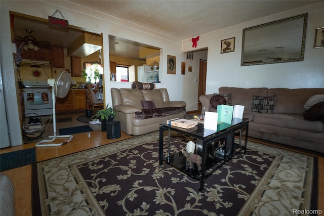 4315 Algonquin St, Detroit, MI 48215 - living room with wood finished floors, a ceiling fan, and ornamental molding