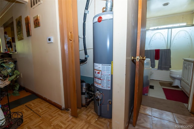 4315 Algonquin St, Detroit, MI 48215 - utility room featuring gas water heater
