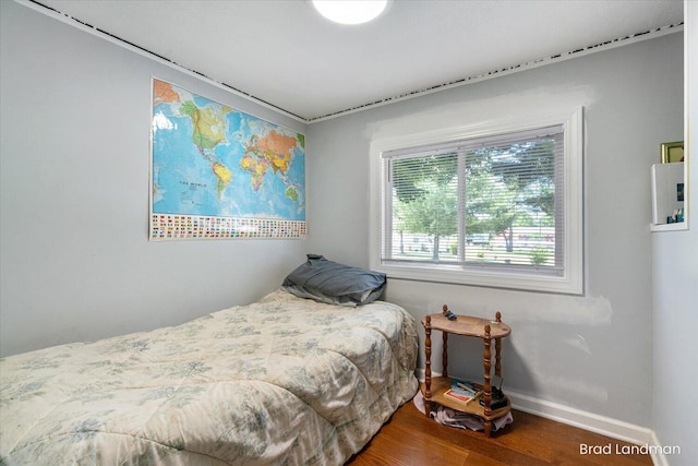 11982 Erica Ln Unit 39, Shelbyville, MI 49344 - bedroom with wood finished floors and baseboards