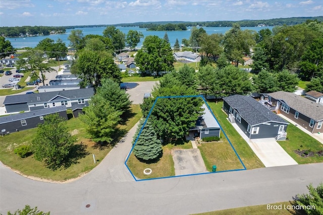 11982 Erica Ln Unit 39, Shelbyville, MI 49344 - aerial view of residential area featuring property boundaries highlighted and a nearby body of water