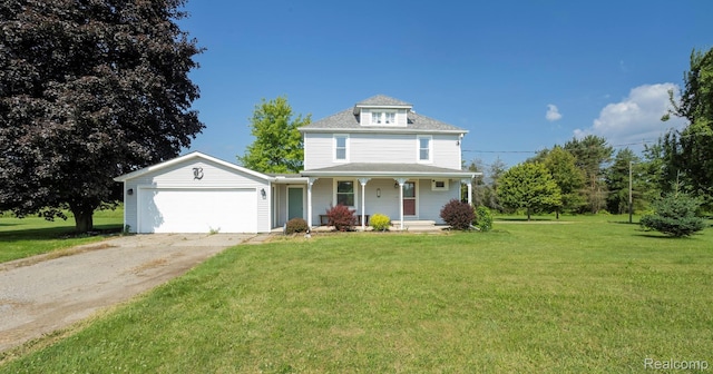 6550 Black River Rd, Croswell, MI 48422 - view of front facade featuring asphalt driveway, covered porch, a garage, and a front lawn