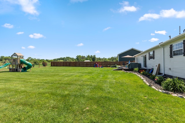 7241 Cherry Ave, Kewadin, MI 49648 - view of yard featuring a playground