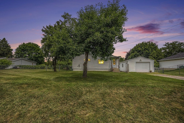 3477 Esson Dr, Grand Blanc, MI 48439 - view of front of house featuring entry steps, dirt driveway, an outbuilding, and a garage