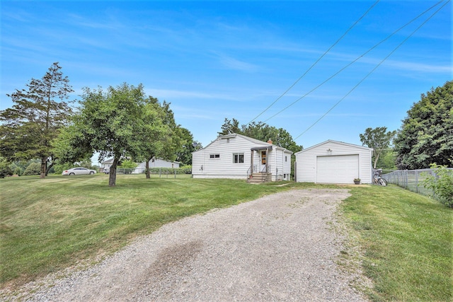 3477 Esson Dr, Grand Blanc, MI 48439 - view of front of house featuring dirt driveway, an outdoor structure, a garage, and entry steps