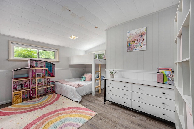 3477 Esson Dr, Grand Blanc, MI 48439 - bedroom with wood finished floors, vaulted ceiling, and wooden walls