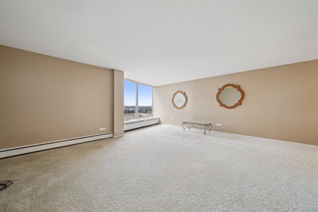 8200 E Jefferson # 1202, Detroit, MI 48214 - empty room featuring baseboard heating, carpet floors, and a wall of windows