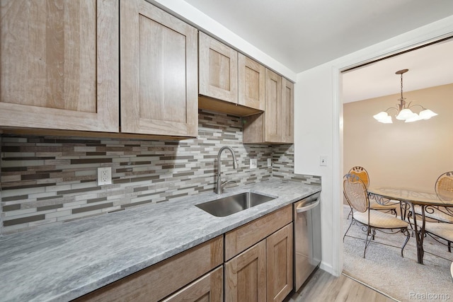 8200 E Jefferson # 1202, Detroit, MI 48214 - kitchen with stainless steel dishwasher, light wood finished floors, decorative backsplash, pendant lighting, and a chandelier
