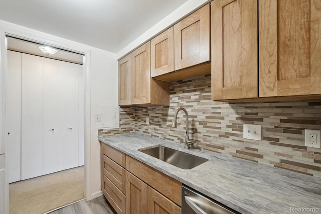 8200 E Jefferson # 1202, Detroit, MI 48214 - kitchen featuring tasteful backsplash, light wood-type flooring, dishwasher, and light stone countertops