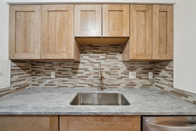 8200 E Jefferson # 1202, Detroit, MI 48214 - kitchen with stainless steel dishwasher, light countertops, tasteful backsplash, and light brown cabinets