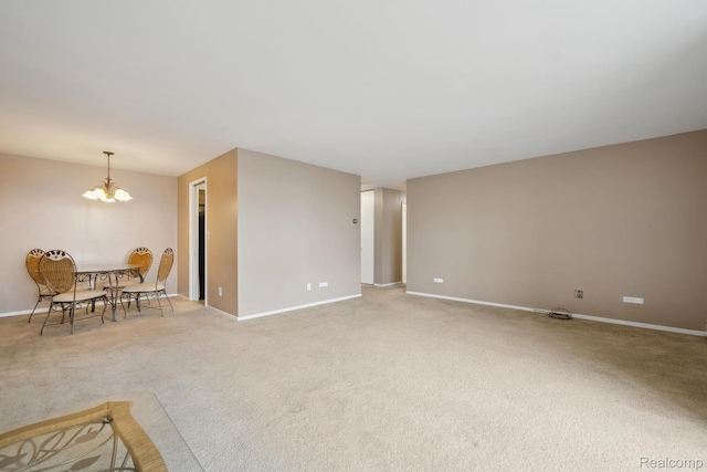 8200 E Jefferson # 1202, Detroit, MI 48214 - living area with a chandelier and light carpet
