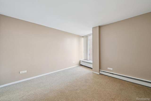 8200 E Jefferson # 1202, Detroit, MI 48214 - unfurnished room with radiator, a baseboard heating unit, and carpet