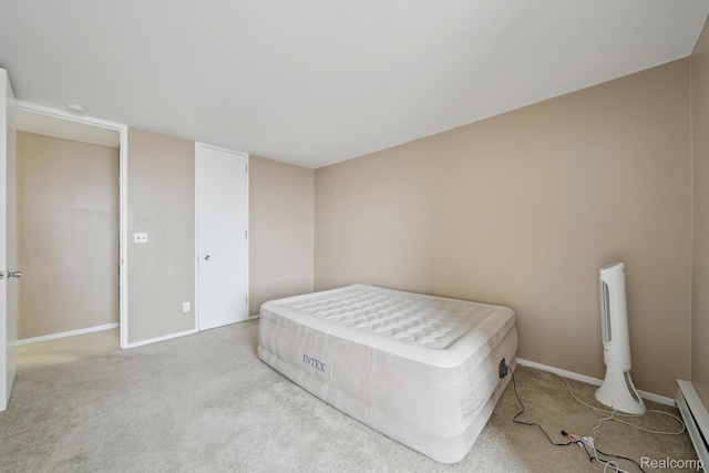 8200 E Jefferson # 1202, Detroit, MI 48214 - bedroom with carpet floors and a baseboard radiator