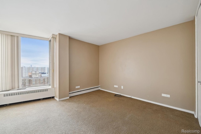 8200 E Jefferson # 1202, Detroit, MI 48214 - carpeted spare room with radiator and a baseboard radiator