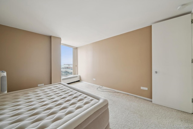 8200 E Jefferson # 1202, Detroit, MI 48214 - bedroom featuring carpet and baseboards