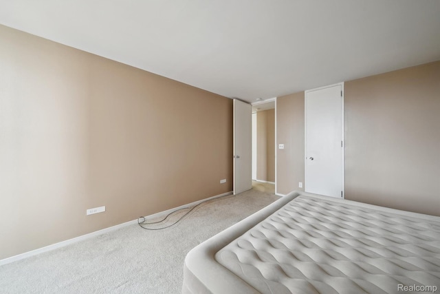 8200 E Jefferson # 1202, Detroit, MI 48214 - unfurnished bedroom with carpet floors and baseboards