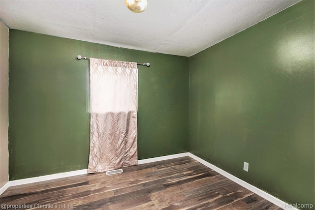 58 Yeamans St, Mount Clemens, MI 48043 - spare room featuring wood finished floors and baseboards