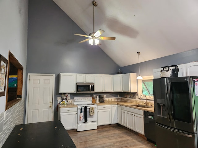 23967 Derek Dr, Sand Lake, MI 49343 - kitchen featuring fridge with ice dispenser, stainless steel microwave, white range with electric stovetop, dishwasher, and high vaulted ceiling