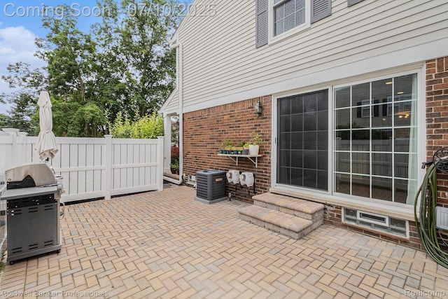 42173 Pellston Dr, Northville, MI 48167 - view of patio / terrace featuring grilling area and entry steps