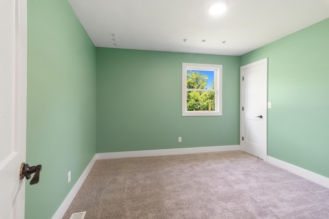 6750 Walters Rd, Clarkston, MI 48346 - spare room featuring carpet and baseboards