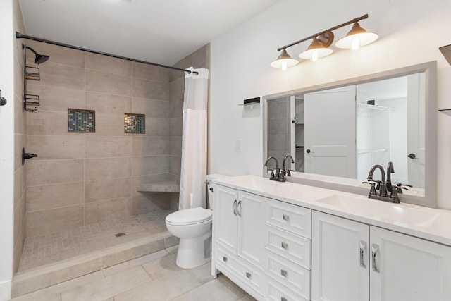 6750 Walters Rd, Clarkston, MI 48346 - bathroom featuring double vanity, tiled shower, and tile patterned floors