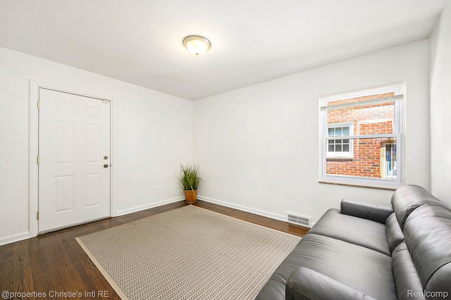 18661 Stoepel St, Detroit, MI 48221 - living area featuring dark wood-style floors