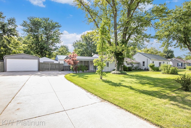 1509 Allen Rd, Kimball, MI 48074 - view of front of property with a detached garage, an outdoor structure, a residential view, and driveway