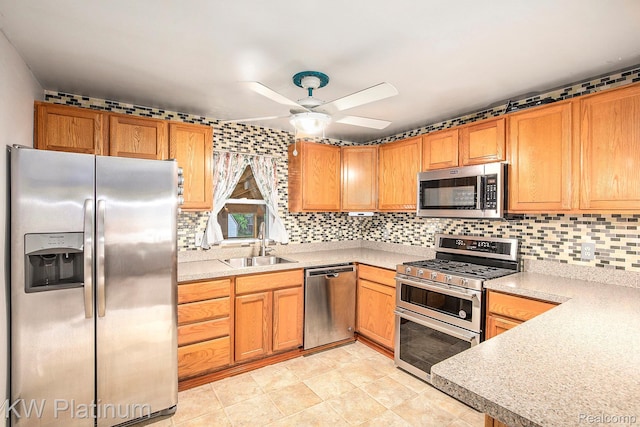 1509 Allen Rd, Kimball, MI 48074 - kitchen featuring appliances with stainless steel finishes, ceiling fan, backsplash, and light countertops