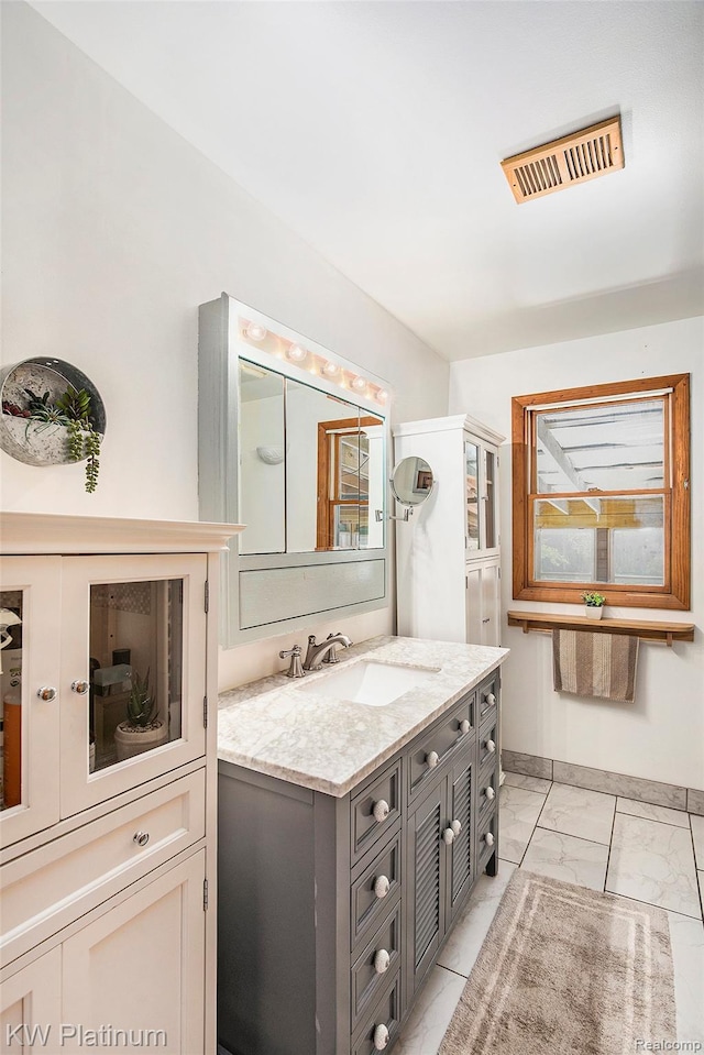 1509 Allen Rd, Kimball, MI 48074 - bathroom featuring marble finish floors and vanity