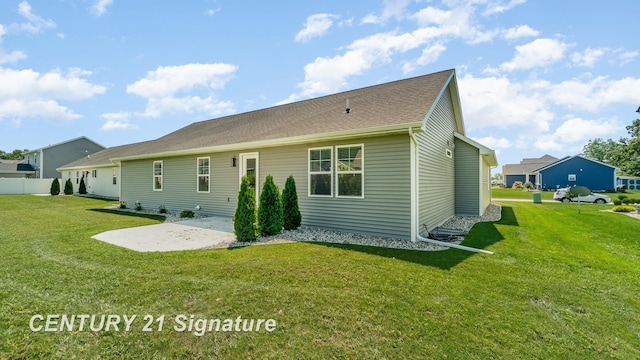 10464 Laurel Woods Pl, Freeland, MI 48623 - rear view of house featuring a yard and a patio
