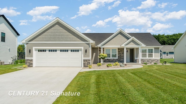 10464 Laurel Woods Pl, Freeland, MI 48623 - craftsman-style house with stone siding, an attached garage, driveway, and a front yard