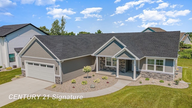 10464 Laurel Woods Pl, Freeland, MI 48623 - view of front of property featuring stone siding, an attached garage, a front lawn, driveway, and roof with shingles