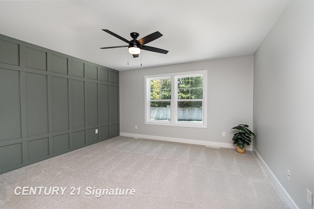 10464 Laurel Woods Pl, Freeland, MI 48623 - empty room with light colored carpet and ceiling fan