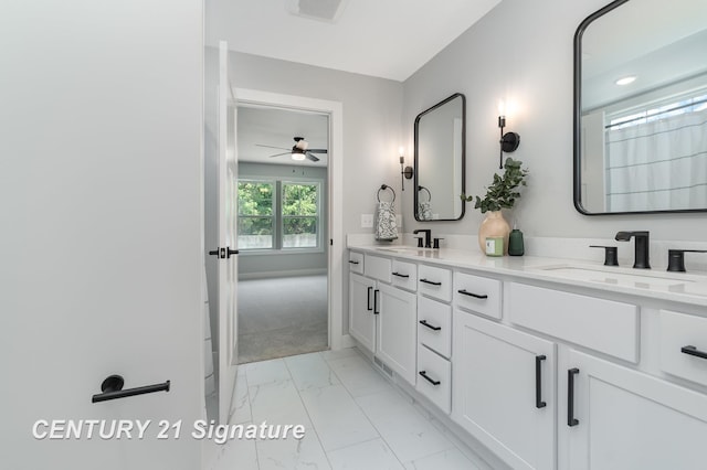 10464 Laurel Woods Pl, Freeland, MI 48623 - full bathroom featuring marble look tile flooring, double vanity, and ceiling fan