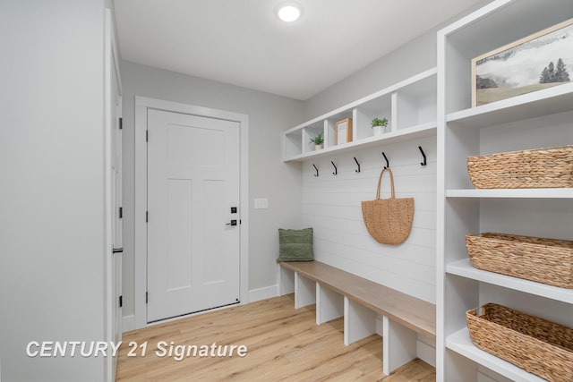 10464 Laurel Woods Pl, Freeland, MI 48623 - mudroom with light wood-style floors and baseboards