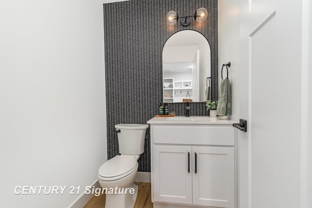 10464 Laurel Woods Pl, Freeland, MI 48623 - half bathroom featuring vanity and toilet