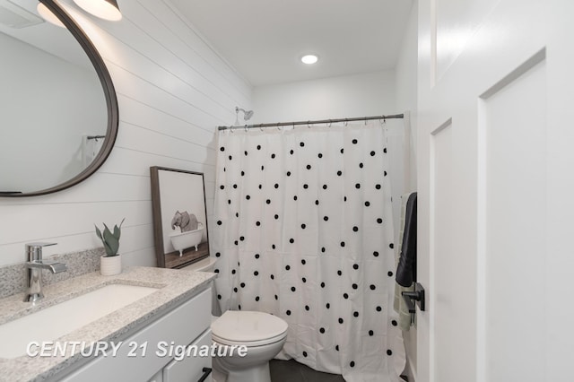 10464 Laurel Woods Pl, Freeland, MI 48623 - full bath featuring vanity, wood walls, and recessed lighting