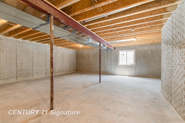 10464 Laurel Woods Pl, Freeland, MI 48623 - basement with brick wall