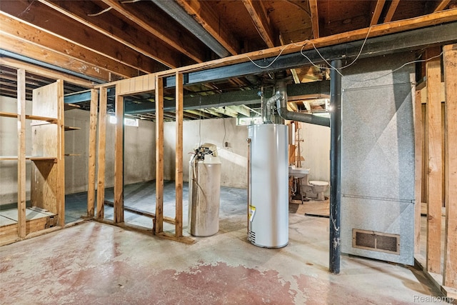 5428 Farmhill Rd, Flint, MI 48505 - unfinished basement featuring water heater, heating unit, and a water softener system