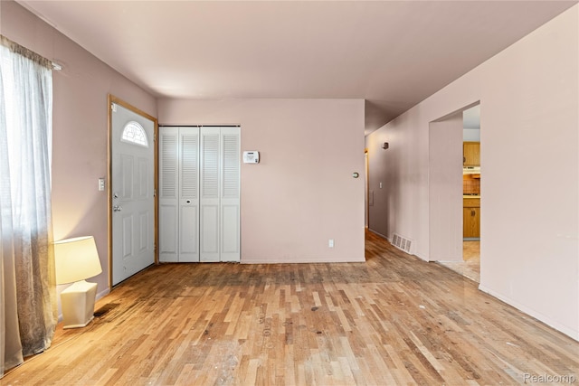 5428 Farmhill Rd, Flint, MI 48505 - entryway with light wood-style flooring and baseboards