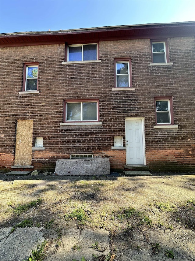 15043 Holmur St, Detroit, MI 48238 - rear view of property featuring brick siding