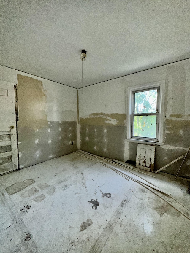 15043 Holmur St, Detroit, MI 48238 - spare room featuring a textured ceiling