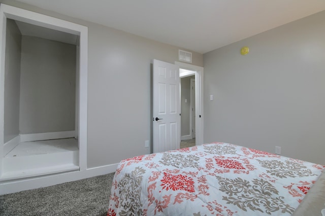 609 W Biddle St, Jackson, MI 49203 - carpeted bedroom featuring baseboards